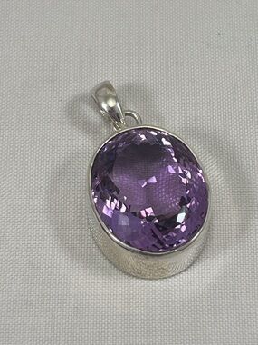 Amethyst and silver pendant